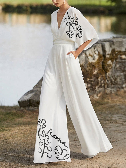 Half Sleeves High Waisted Flower Print Pleated Pockets Deep V-Neck Jumpsuits